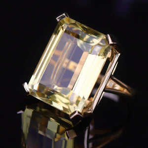 Vintage ring with a large emerald cut citrine in 14k yellow gold