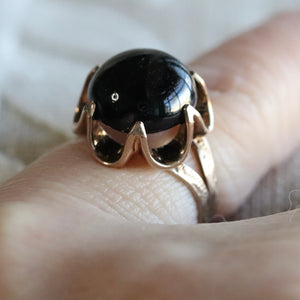 Vintage obsidian cabochon ring in yellow gold