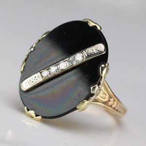 Oval vintage black onyx and diamond ring in yellow gold ring By Manor Jewels