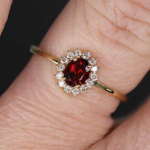 Garnet and diamond ring in yellow gold