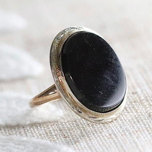 Classic oval onyx vintage ring in yellow and white gold