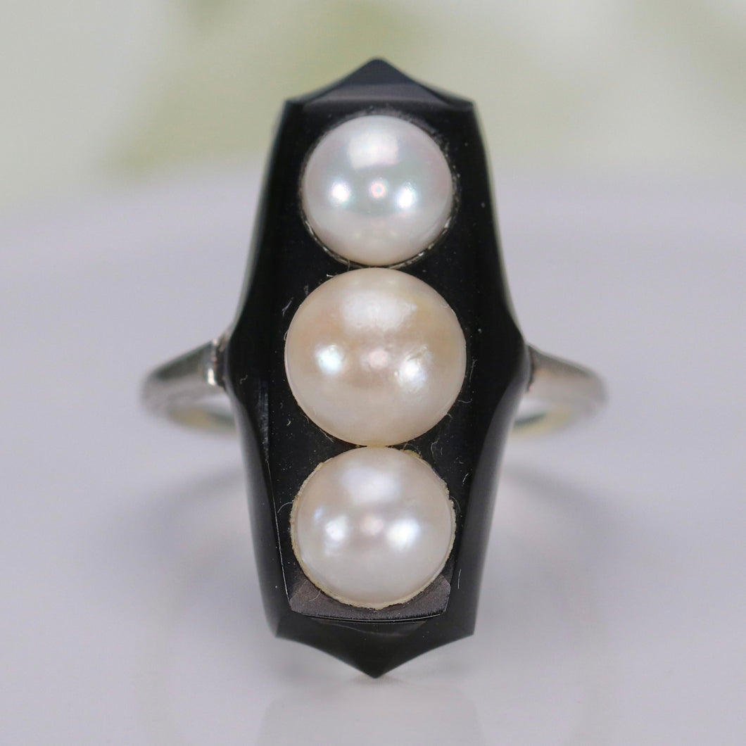 Vintage onyx and pearl ring in platinum