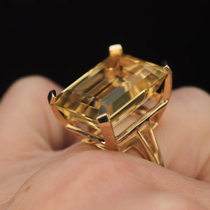 Vintage ring with a large emerald cut citrine in 14k yellow gold