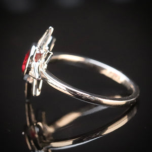 Ruby and diamond compass ring in 14k white gold from Manor Jewels