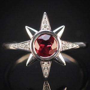 Ruby and diamond compass ring in 14k white gold from Manor Jewels