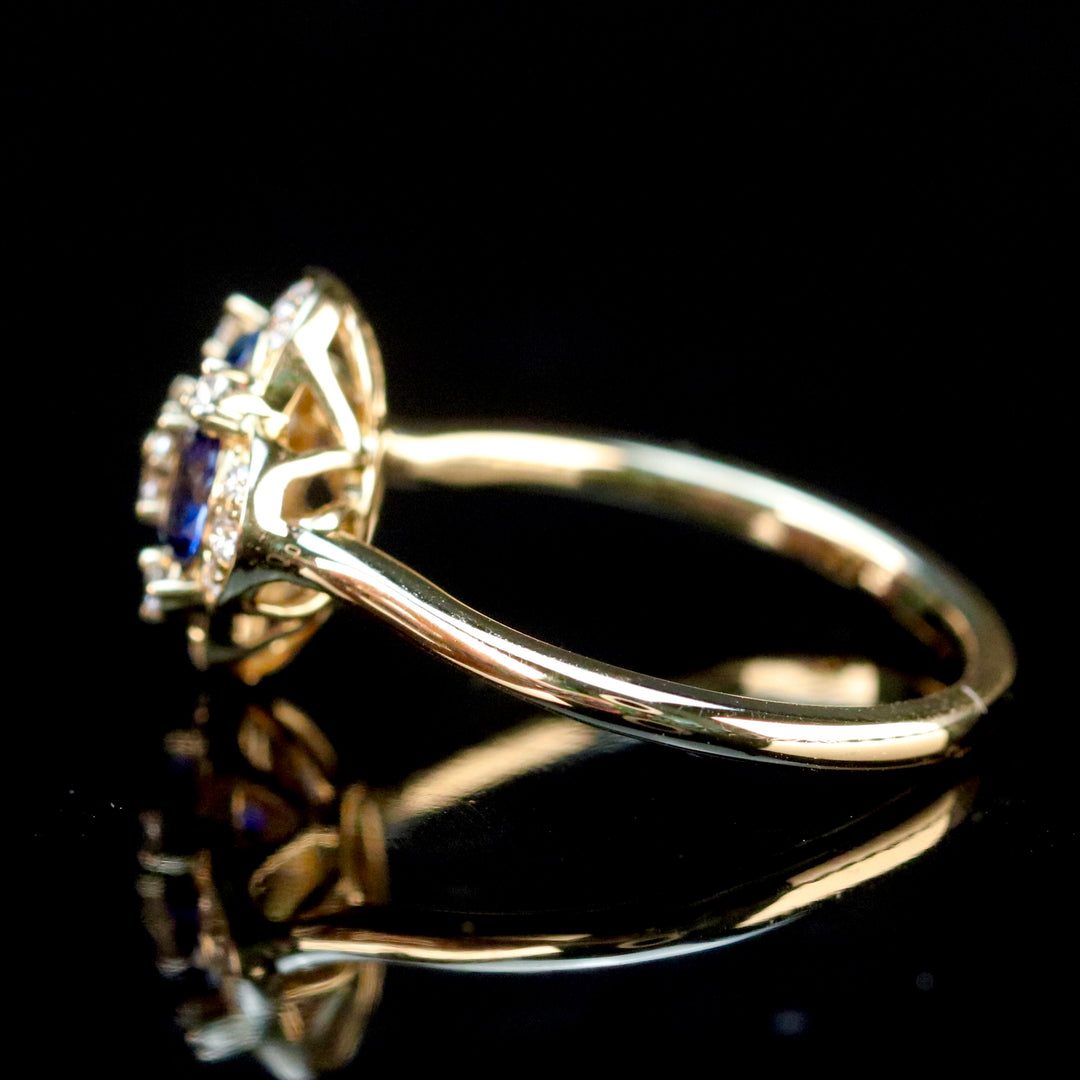 Sapphire and diamond cluster ring in 14k yellow gold