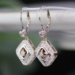 Chocolate and white earth mined diamond earrings in 14k white gold