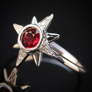 Ruby and diamond compass ring in 14k white gold from Manor Jewels