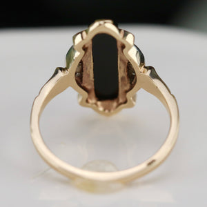 Vintage Onyx and diamond ring in yellow gold