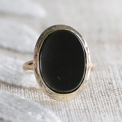 Classic oval onyx vintage ring in yellow and white gold