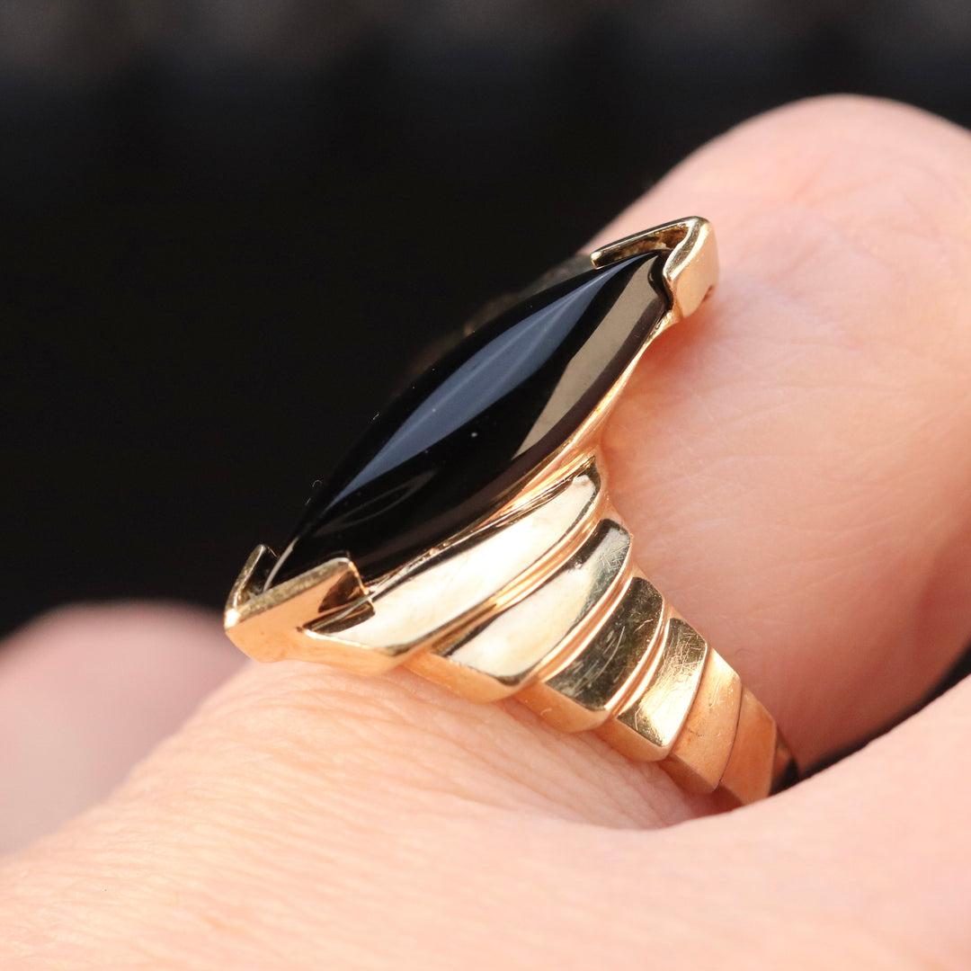 Vintage onyx navette ring in yellow gold