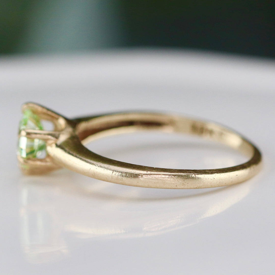 Vintage green spinel solitaire ring in yellow gold