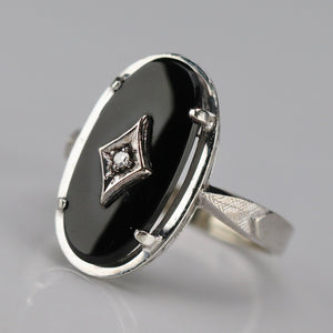 Oval onyx and diamond vintage ring in white gold from Manor Jewels