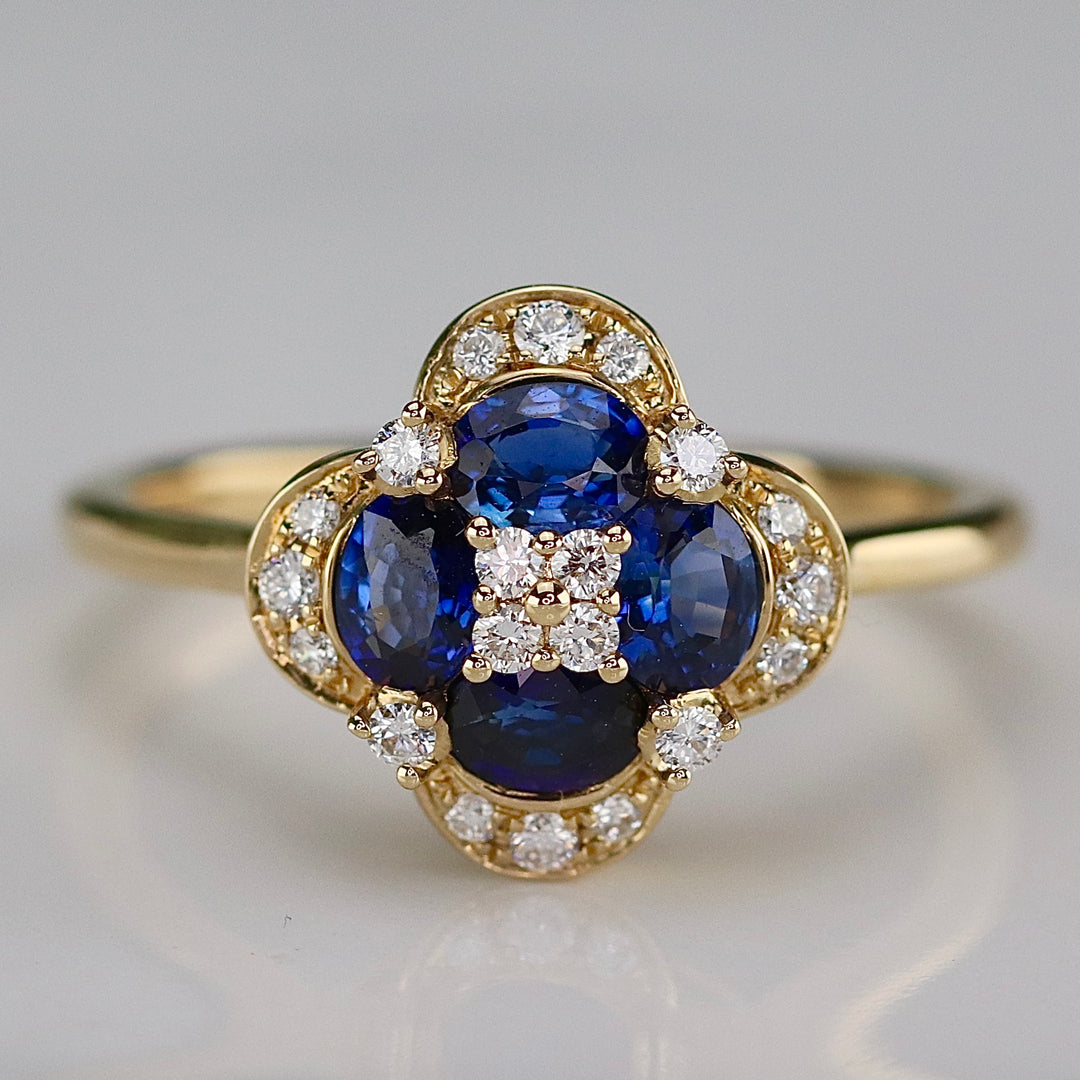 Sapphire and diamond cluster ring in 14k yellow gold