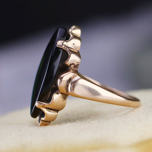 Vintage onyx navette ring in yellow gold