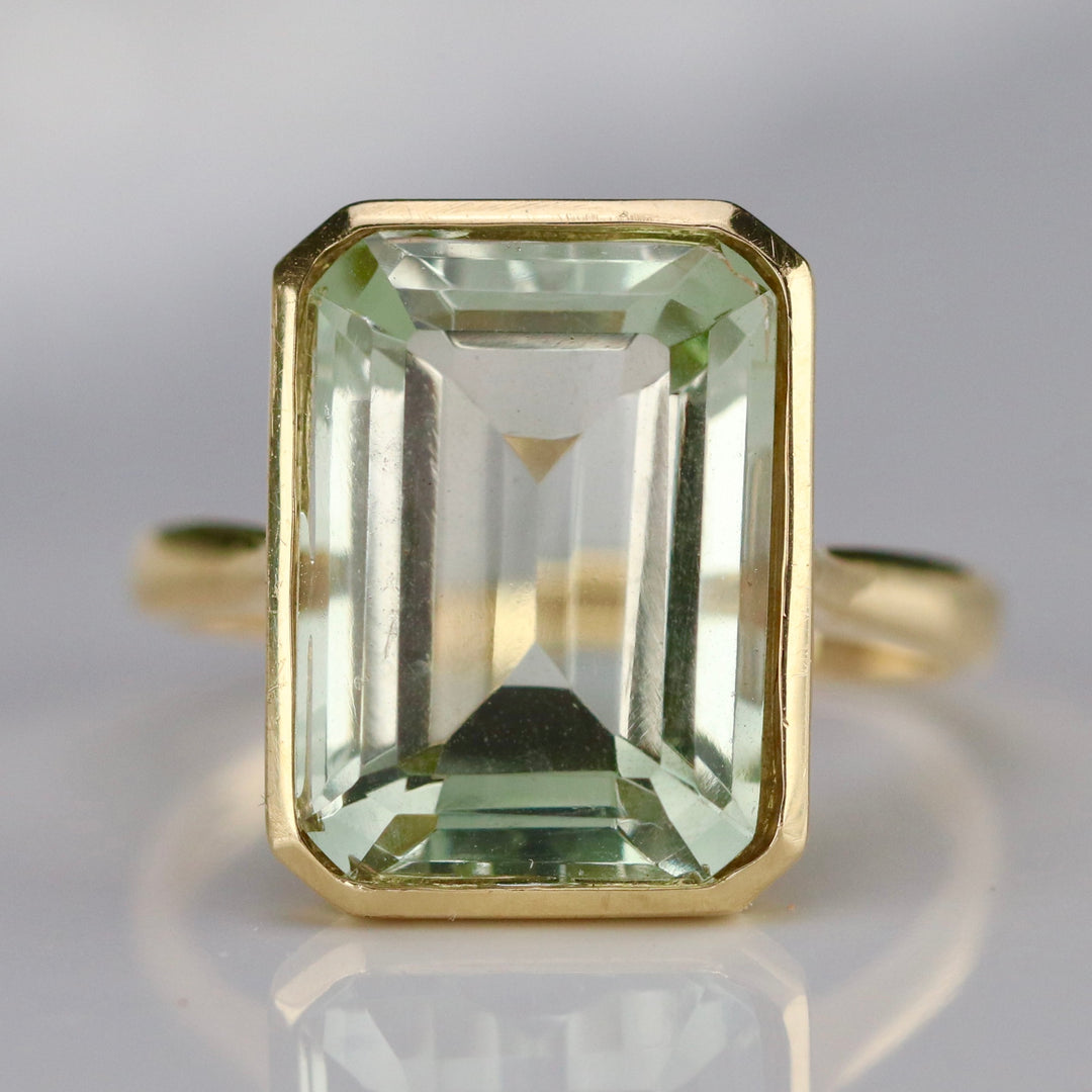 Emerald cut 8.28ct prasiolite ring in 14k yellow gold