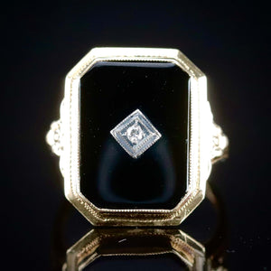 Vintage onyx and diamond ring in yellow gold