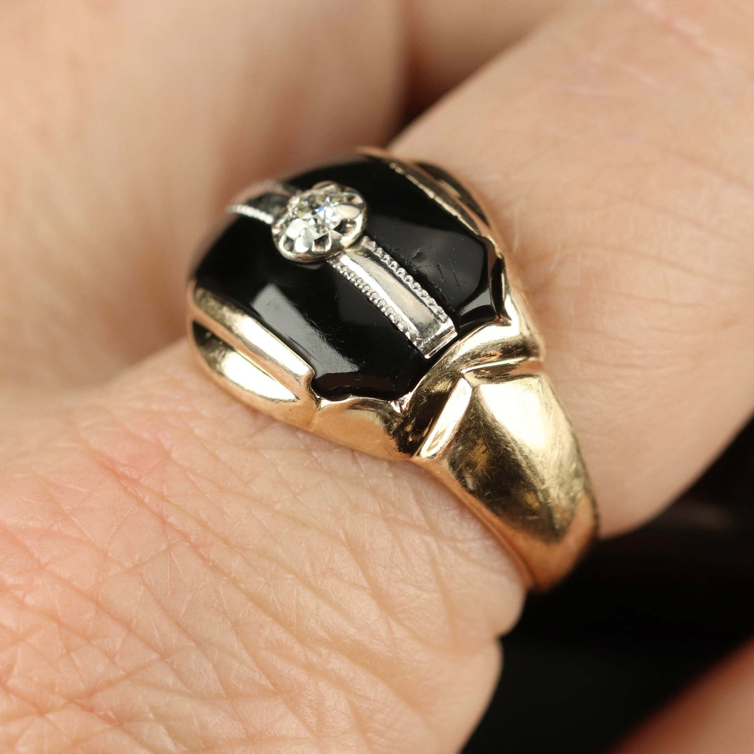 Vintage onyx and diamond ring in yellow gold