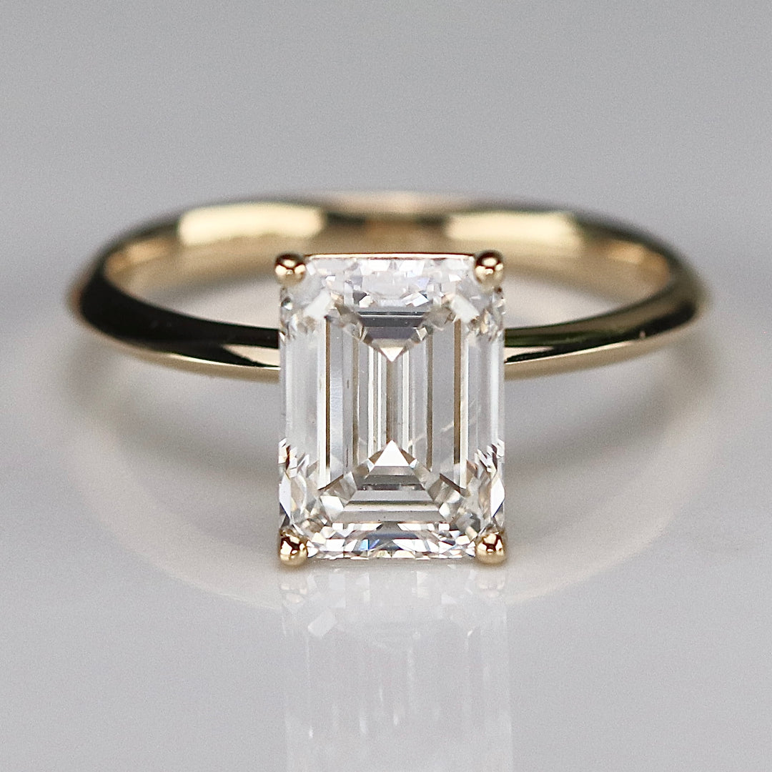 SPECIAL: 3ct emerald cut lab grown solitaire diamond ring in 14k yellow gold