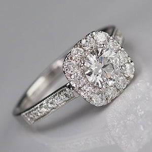 Lab grown diamond halo ring in 14k white gold