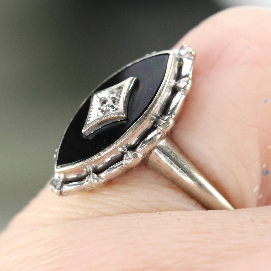 Vintage navette onyx and diamond ring in white gold