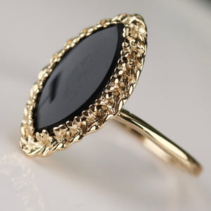 Vintage onyx navette ring in yellow gold