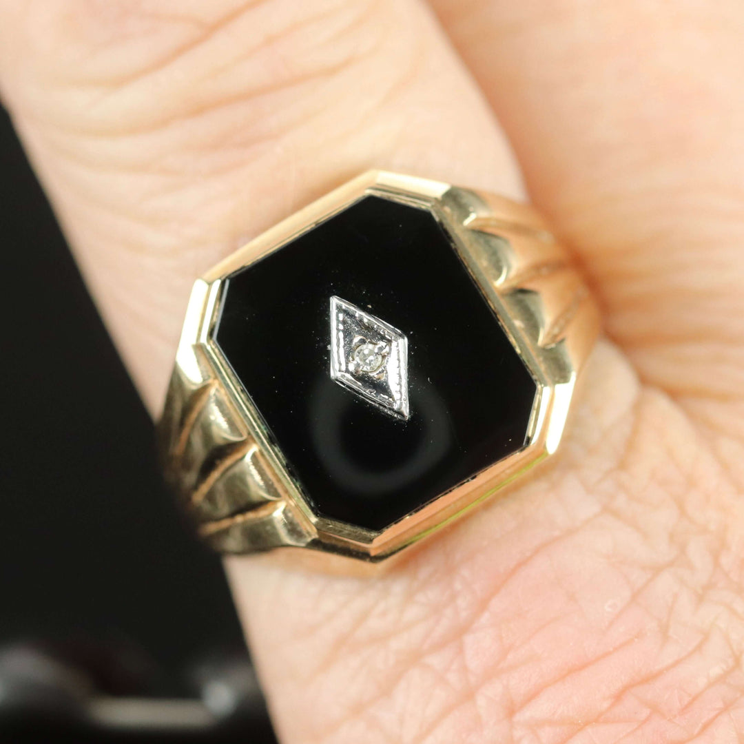 Vintage large onyx and diamond ring in yellow gold