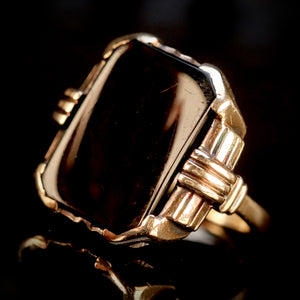 Heavy vintage onyx ring in yellow gold