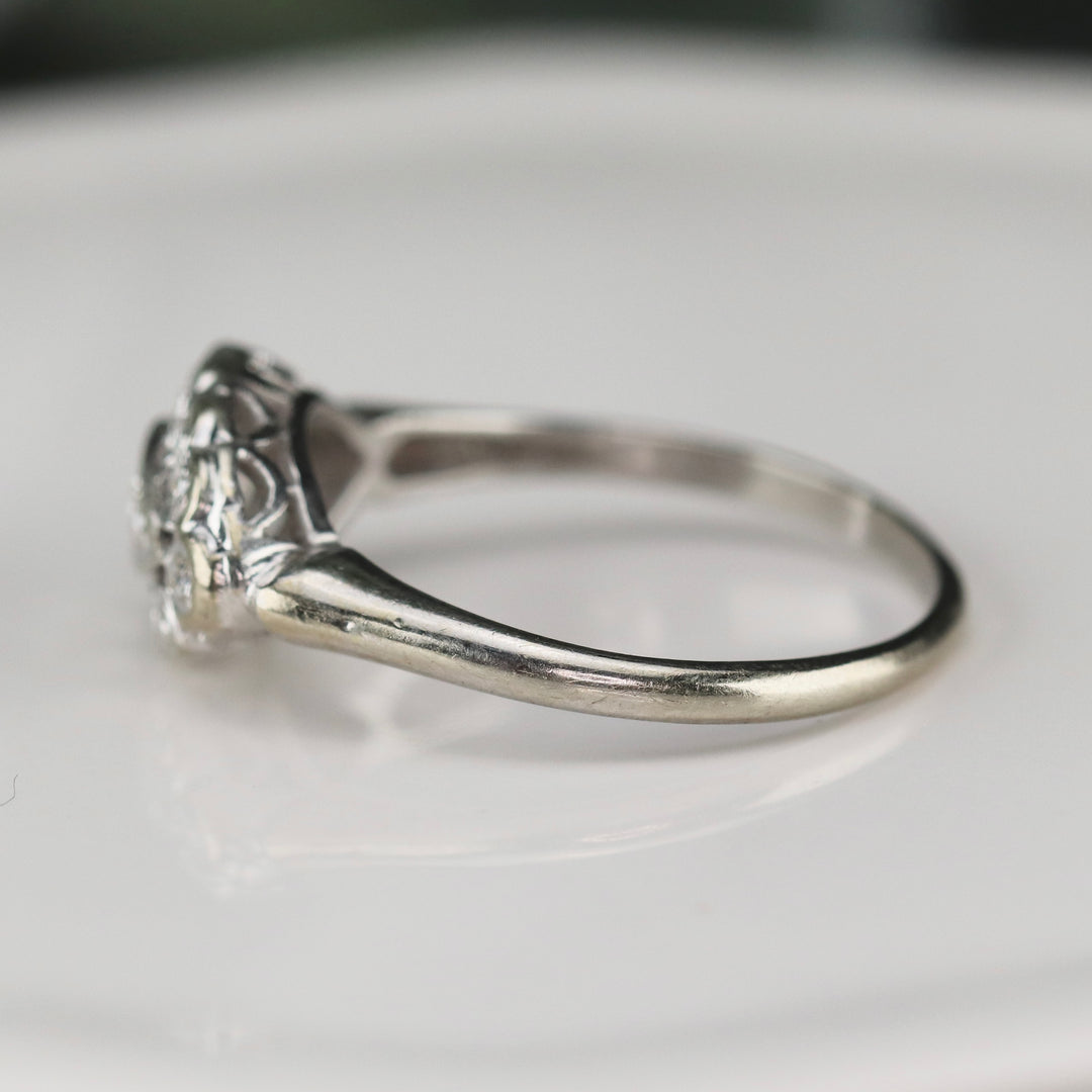 Princess style diamond ring in 14k white gold