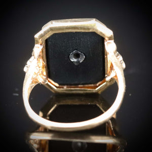 Vintage onyx and diamond ring in yellow gold