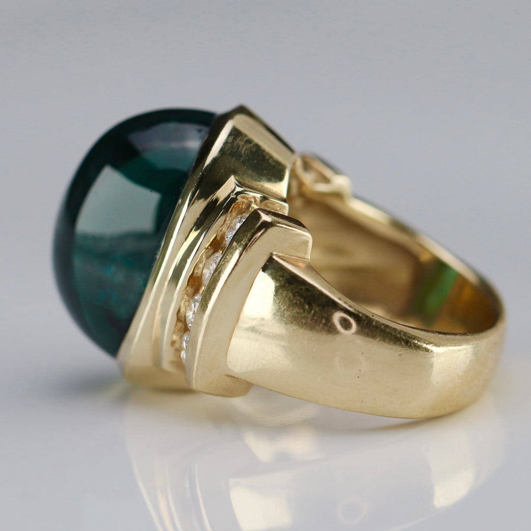 Estate green tourmaline and diamond ring in 14k yellow gold