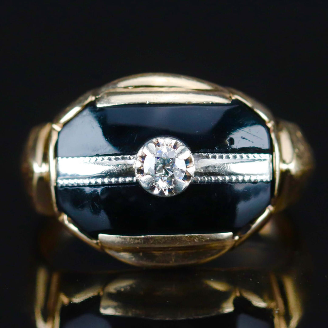 Vintage onyx and diamond ring in yellow gold