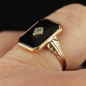 Classic vintage onyx and diamond ring in yellow gold