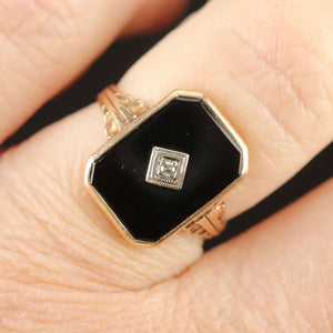 Classic vintage onyx and diamond ring in yellow gold