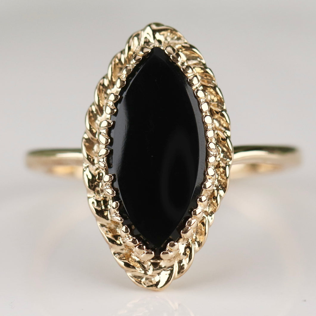 Vintage onyx navette ring in yellow gold