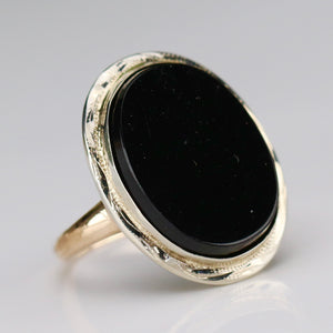 Oval black onyx vintage gold ring in yellow and white gold by Manor Jewels