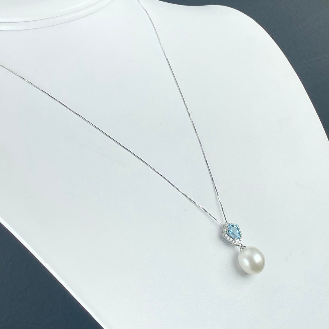 50% OFF CLEARANCE!  14k white gold exceptional blue topaz, diamond and pearl necklace