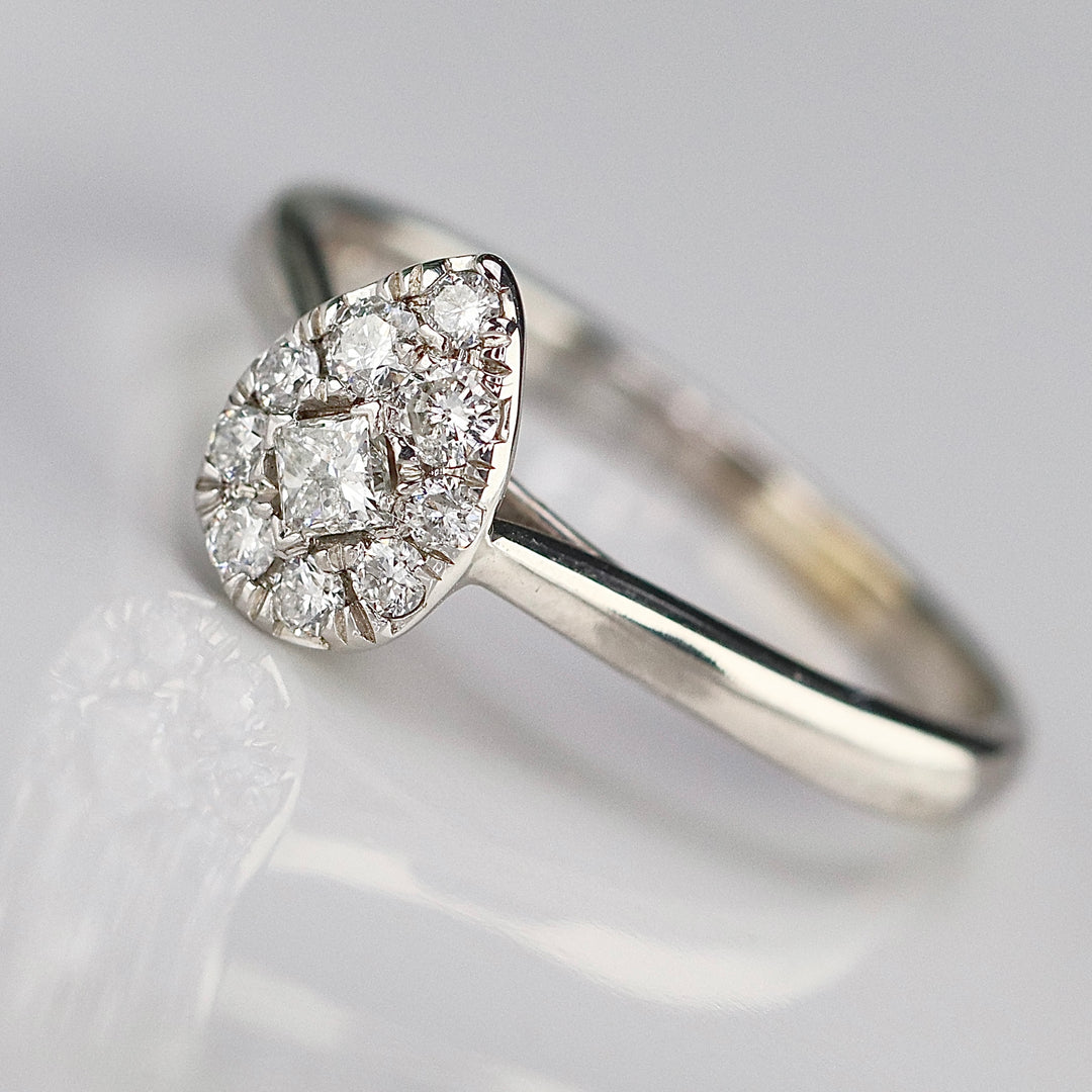 Pear shape diamond cluster ring in 14k white gold