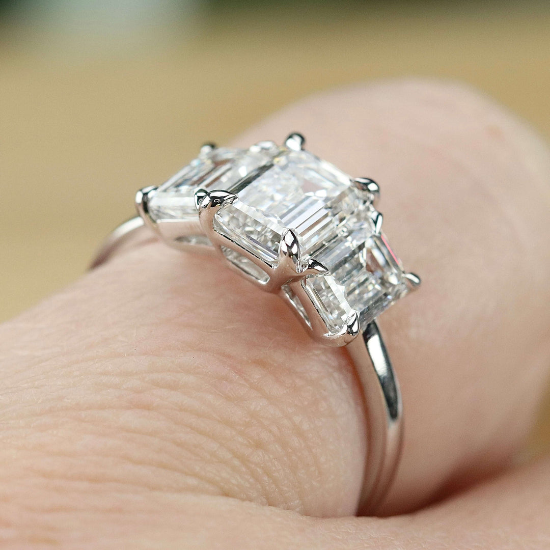 SPECIAL: MANOR ROYAL:  The Charlotte - 3 stone 3.03ctw lab grown emerald cut diamond ring in platinum