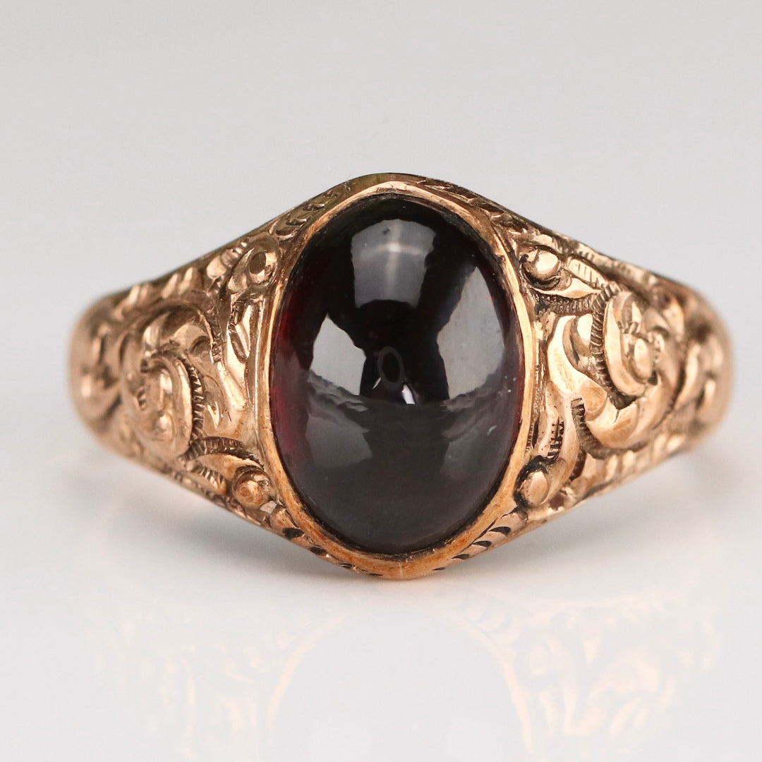 Antique garnet cabochon ring in rose gold