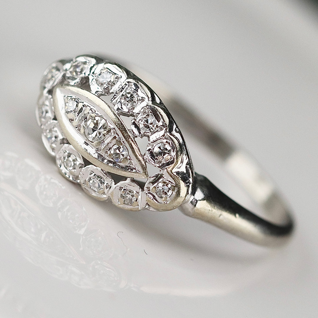 Princess style diamond ring in 14k white gold