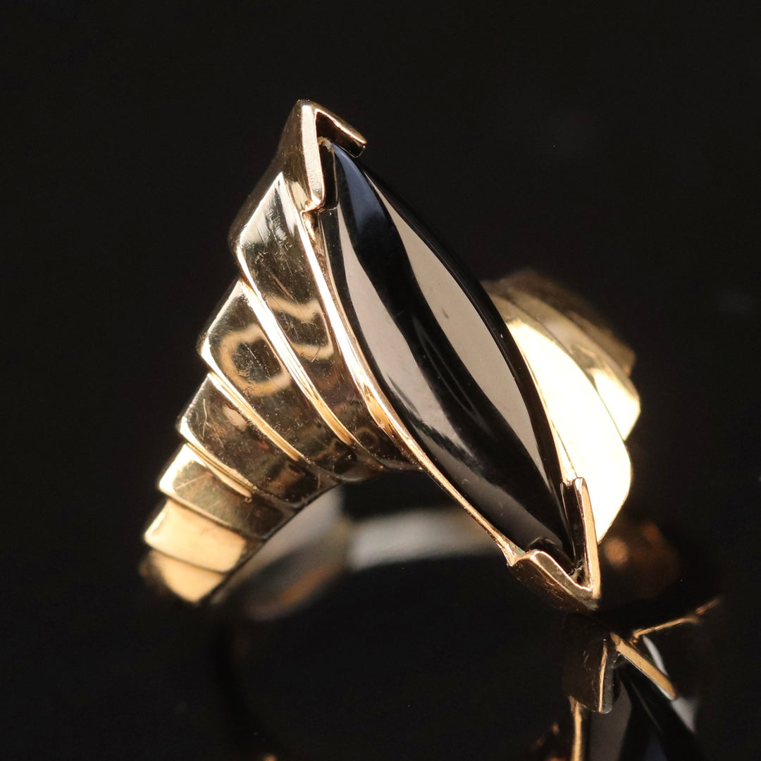 Vintage onyx navette ring in yellow gold