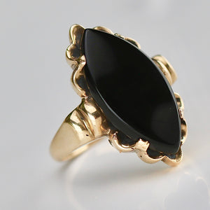 Vintage onyx navette ring in yellow gold