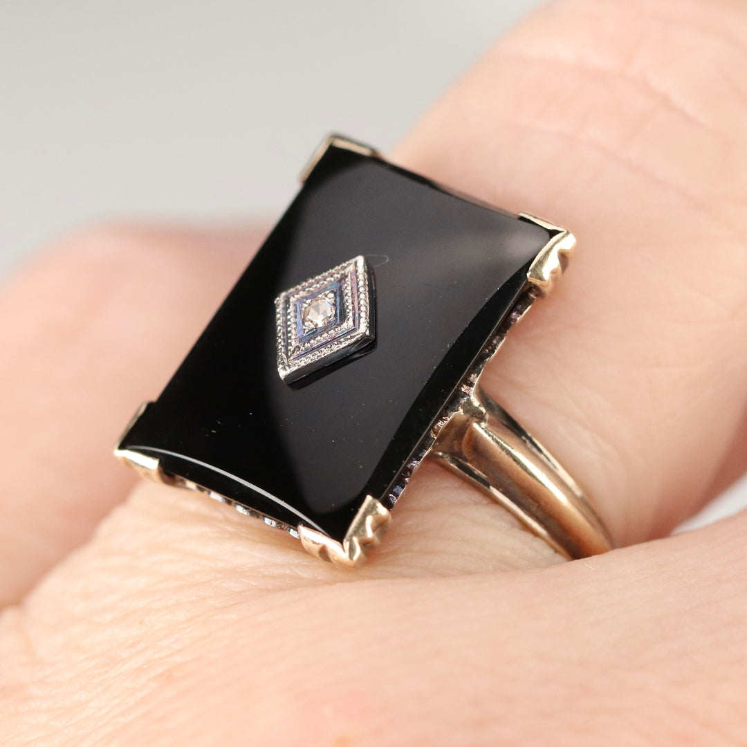 Vintage onyx and diamond ring in yellow gold