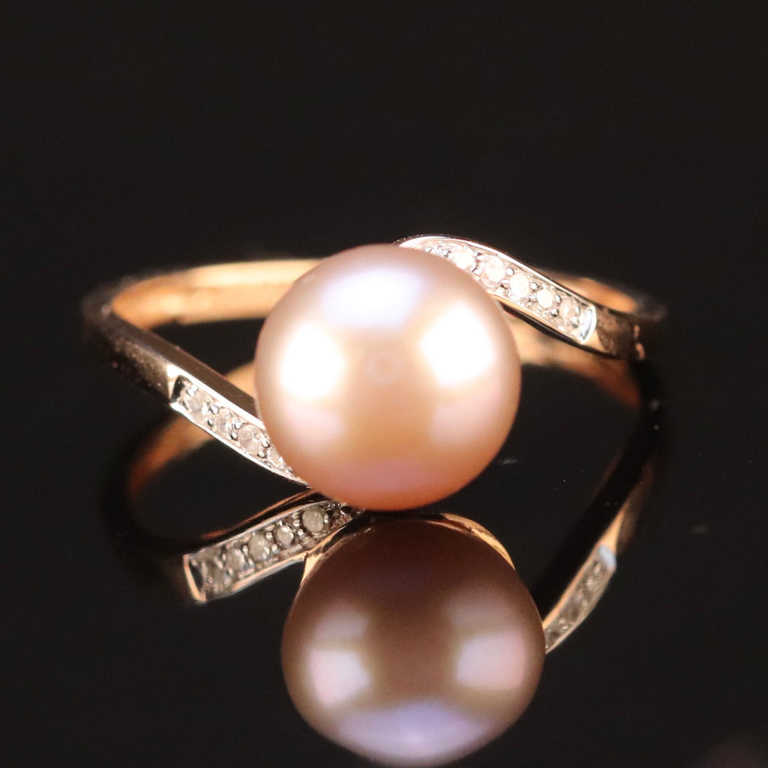 Pink pearl and diamond ring in 14k rose gold