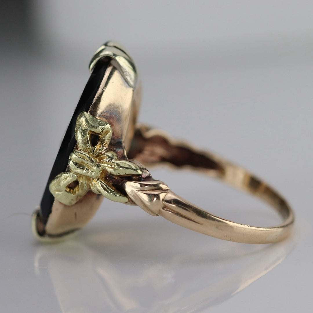 Vintage onyx and diamond ring in yellow gold