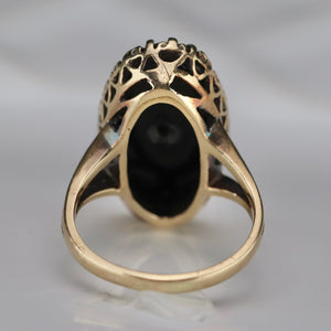 Classic vintage onyx and diamond ring in yellow gold