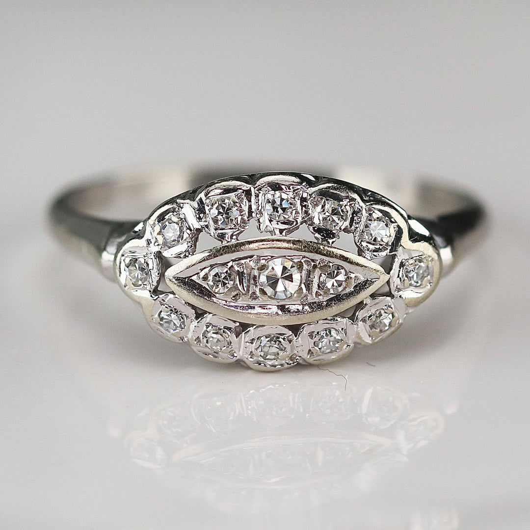 Princess style diamond ring in 14k white gold