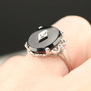 Vintage Onyx and diamond ring in white gold