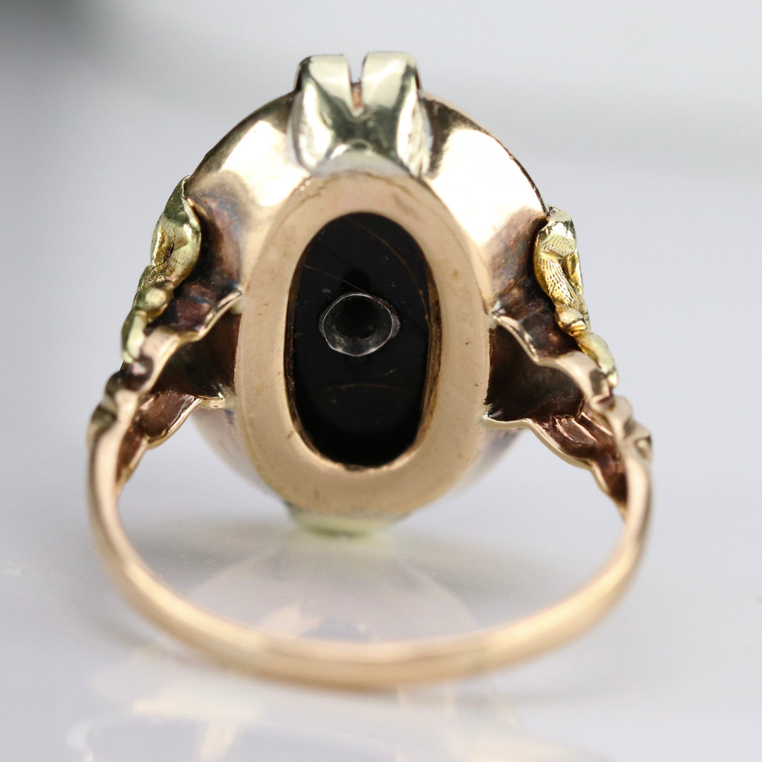 Vintage onyx and diamond ring in yellow gold